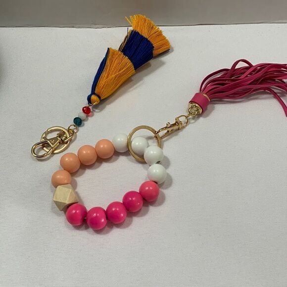 Set of two tassel keychains. Both are NWOT - Picture 1 of 5